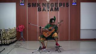 Gambar utama Surya Muhammad Mewakili SMKN 5 Batam Dalam Ajang FLS2N Cabang Gitar Solo